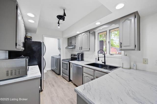 6507 S Dr, Louisville, KY 40272 - kitchen featuring stainless steel appliances, gray cabinetry, a sink, washing machine and dryer, and recessed lighting