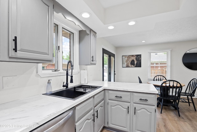 6507 S Dr, Louisville, KY 40272 - kitchen featuring a peninsula, gray cabinetry, a sink, recessed lighting, and plenty of natural light