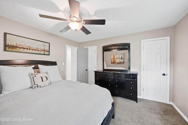 6507 S Dr, Louisville, KY 40272 - bedroom with baseboards, light carpet, and a ceiling fan