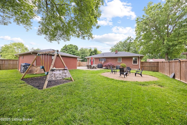 6507 S Dr, Louisville, KY 40272 - view of yard featuring an outdoor fire pit and a patio area