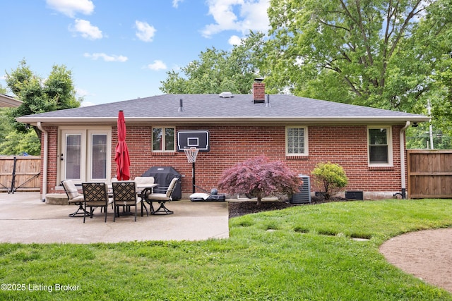 6507 S Dr, Louisville, KY 40272 - rear view of property with a patio, a chimney, brick siding, and cooling unit
