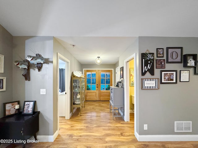444 Wire Ln, Bardstown, KY 40004 - hallway with baseboards, french doors, visible vents, and light wood-style floors