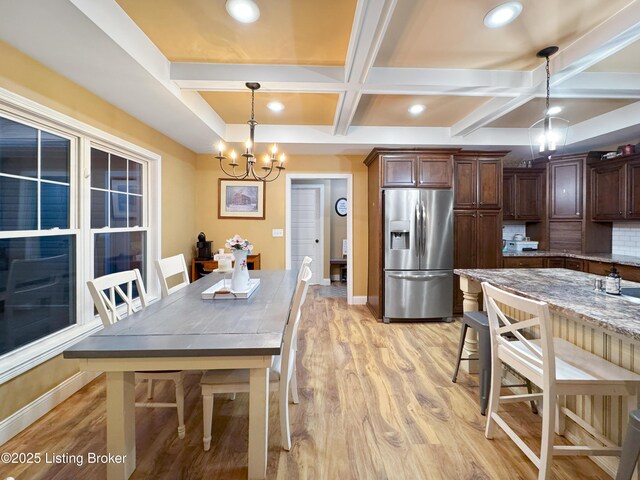 444 Wire Ln, Bardstown, KY 40004 - dining space with light wood finished floors, an inviting chandelier, recessed lighting, and coffered ceiling