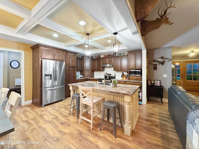 444 Wire Ln, Bardstown, KY 40004 - kitchen featuring stainless steel appliances, light wood-style flooring, a sink, coffered ceiling, and under cabinet range hood