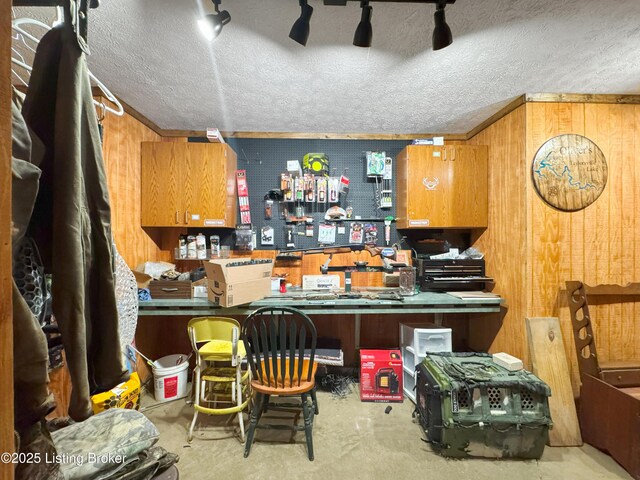 444 Wire Ln, Bardstown, KY 40004 - kitchen featuring concrete flooring, wooden walls, and a textured ceiling