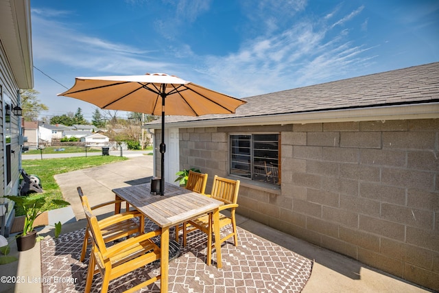 view of patio featuring outdoor dining area