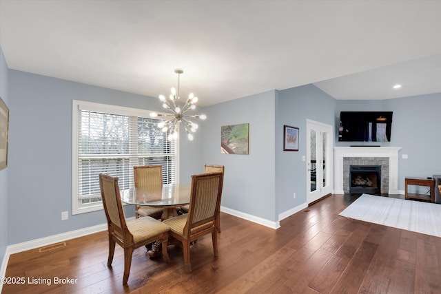 178 Bluffs Edge Dr, Mt Washington, KY 40047 - dining space featuring baseboards, a notable chandelier, visible vents, and hardwood / wood-style flooring