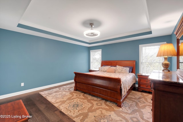 178 Bluffs Edge Dr, Mt Washington, KY 40047 - bedroom with a tray ceiling, crown molding, wood finished floors, and baseboards