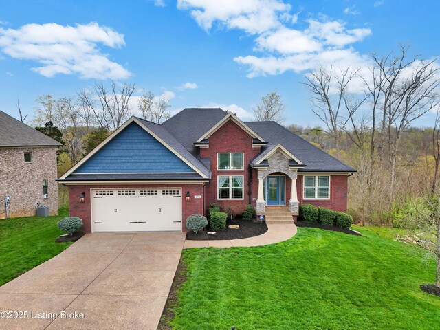 178 Bluffs Edge Dr, Mt Washington, KY 40047 - craftsman-style house with an attached garage, driveway, a front lawn, and brick siding