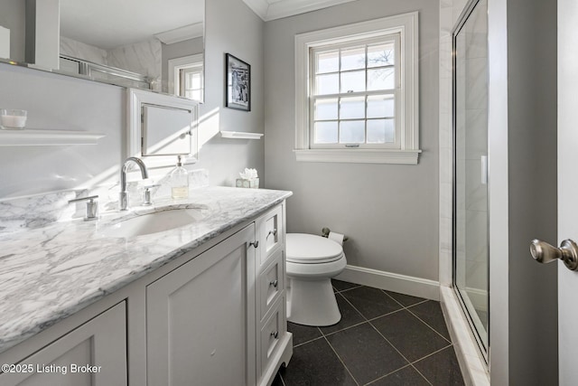 bathroom with toilet, a tile shower, crown molding, vanity, and tile patterned flooring