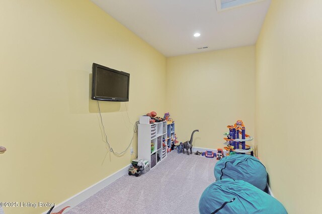 recreation room featuring baseboards, carpet flooring, visible vents, and recessed lighting