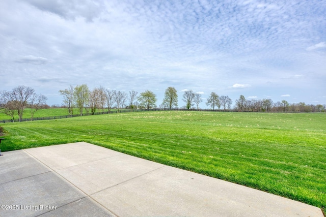 view of patio with a rural view