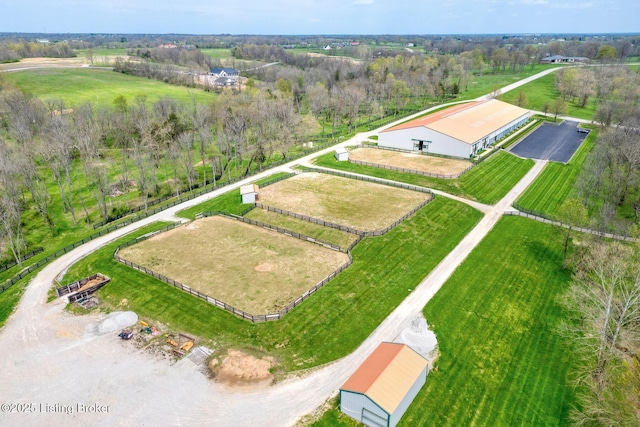 birds eye view of property featuring a rural view