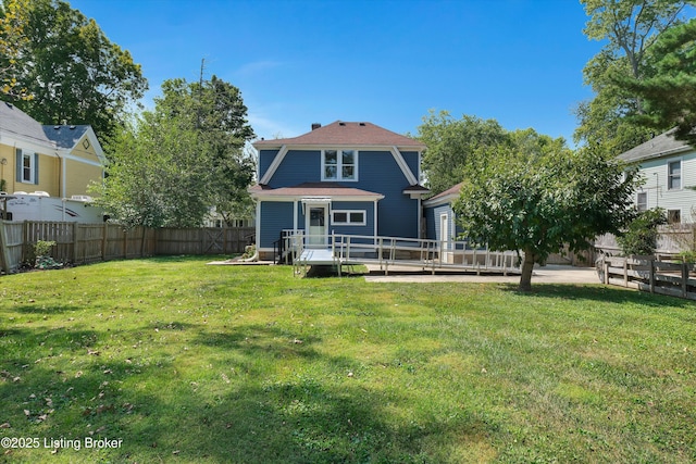 205 Birch Ave, La Grange, KY 40031 - rear view of house featuring a lawn, a deck, and a fenced backyard