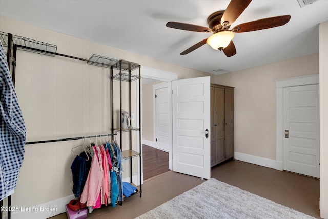 205 Birch Ave, La Grange, KY 40031 - unfurnished bedroom featuring a ceiling fan, wood finished floors, and baseboards