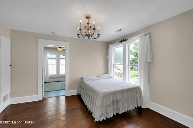 205 Birch Ave, La Grange, KY 40031 - bedroom featuring visible vents, a chandelier, dark wood-style floors, and baseboards