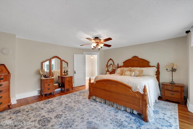 205 Birch Ave, La Grange, KY 40031 - bedroom featuring a ceiling fan, wood finished floors, and baseboards