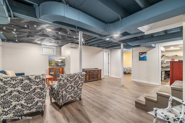 basement with wood finished floors