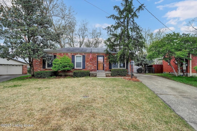 single story home with brick siding, an outdoor structure, and a front lawn