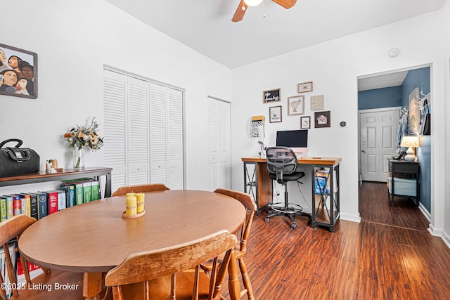 dining room featuring ceiling fan, baseboards, and wood finished floors