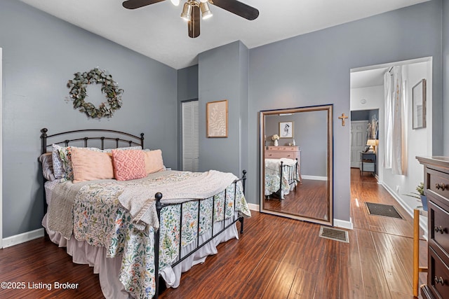 bedroom with wood finished floors and visible vents