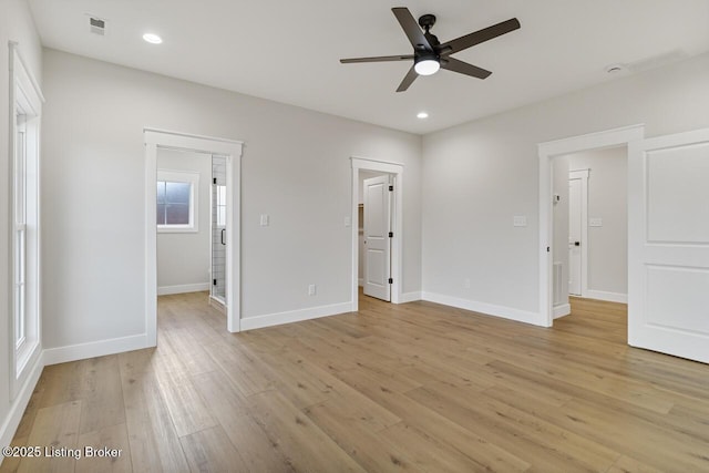 unfurnished bedroom featuring light wood-style floors, baseboards, visible vents, and recessed lighting