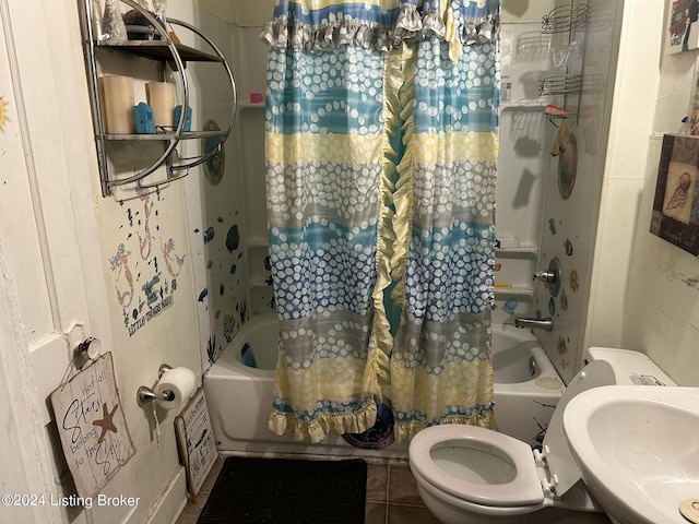 1212 Queen Ave, Louisville, KY 40215 - bathroom featuring toilet, shower / tub combo, and a sink