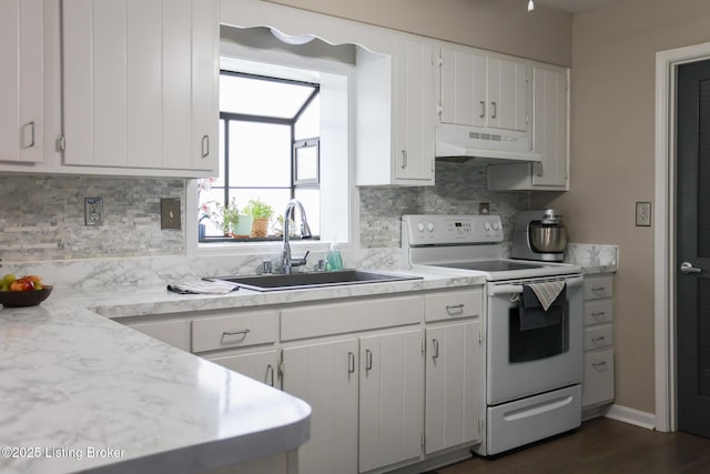 7407 Meadow Rd, Crestwood, KY 40014 - kitchen featuring white range with electric stovetop, under cabinet range hood, a sink, light countertops, and decorative backsplash