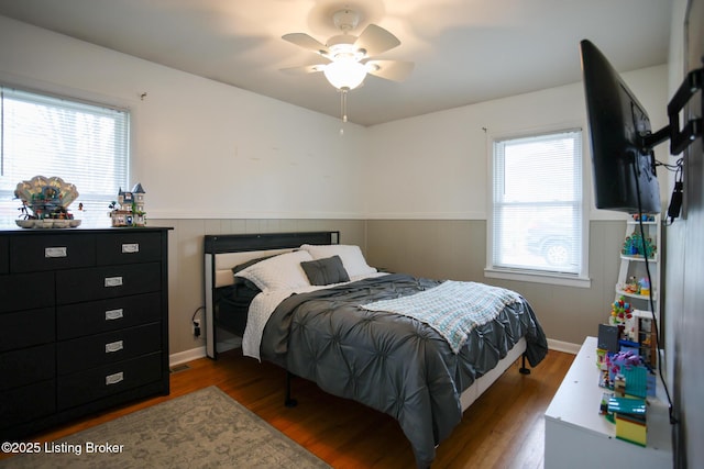 7407 Meadow Rd, Crestwood, KY 40014 - bedroom featuring a wainscoted wall, wood finished floors, and a ceiling fan