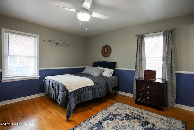 7407 Meadow Rd, Crestwood, KY 40014 - bedroom with wood finished floors, baseboards, and ceiling fan
