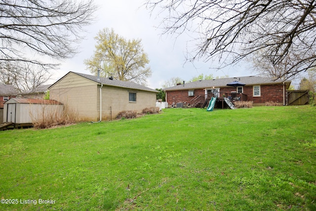 7407 Meadow Rd, Crestwood, KY 40014 - view of yard with a shed, an outbuilding, stairway, and a deck