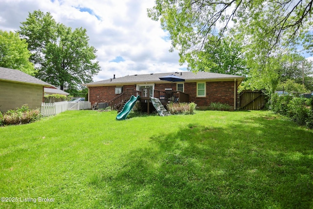 7407 Meadow Rd, Crestwood, KY 40014 - back of house with brick siding, a deck, and a playground
