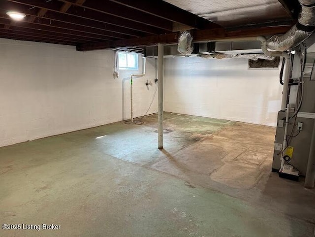 below grade area featuring heating unit