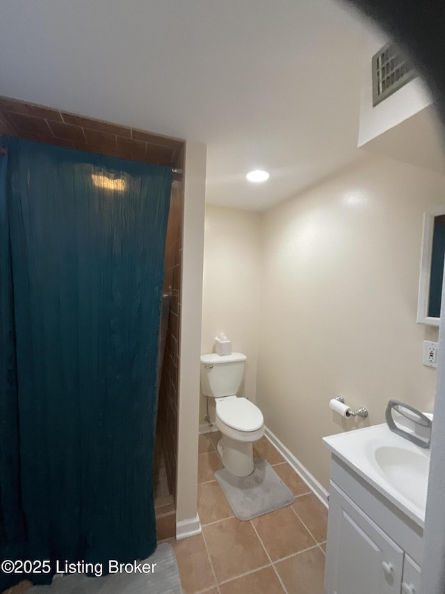 full bathroom with tile patterned floors, visible vents, toilet, vanity, and a shower