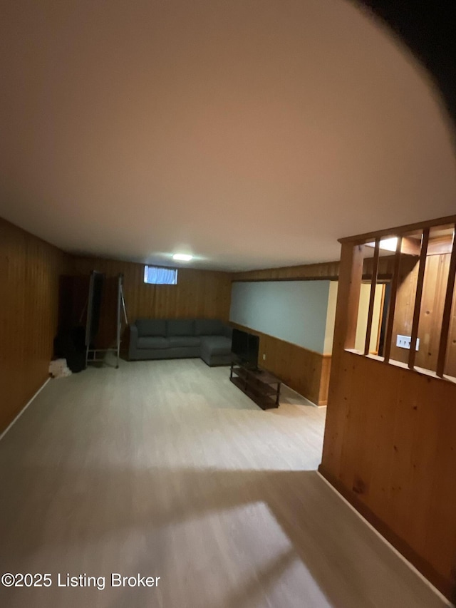 interior space with wooden walls and carpet