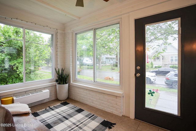 216 Cornell Pl, Louisville, KY 40207 - sunroom / solarium featuring tile patterned floors, plenty of natural light, and a wall mounted air conditioner