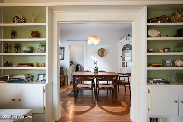 216 Cornell Pl, Louisville, KY 40207 - dining room with wood finished floors and built in shelves