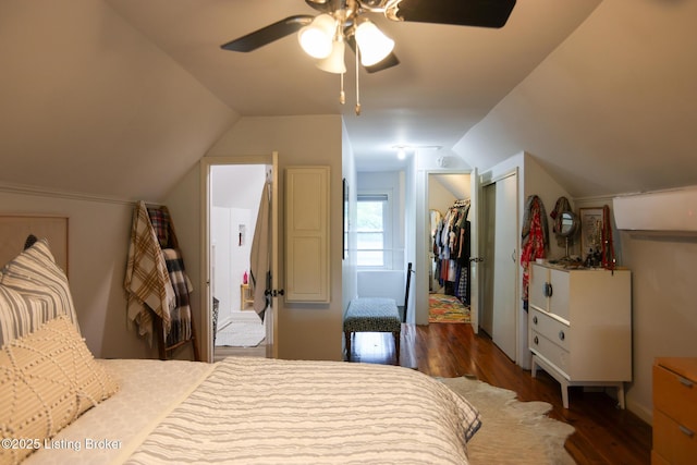 216 Cornell Pl, Louisville, KY 40207 - bedroom with lofted ceiling, wood finished floors, a closet, ensuite bath, and a ceiling fan