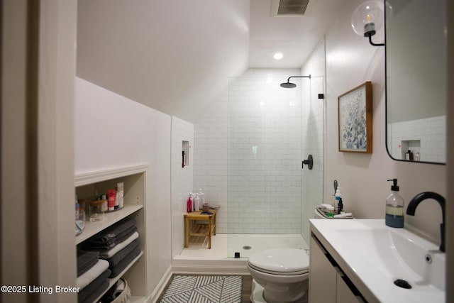 216 Cornell Pl, Louisville, KY 40207 - full bathroom featuring vanity, a tile shower, toilet, and lofted ceiling