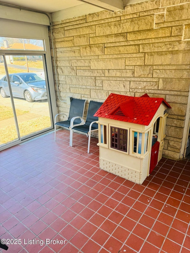 view of unfurnished sunroom