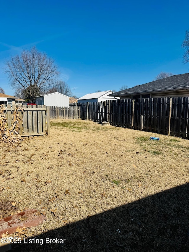 view of yard featuring a fenced backyard