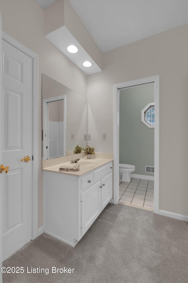 bathroom with tile patterned flooring, visible vents, toilet, vanity, and carpet floors