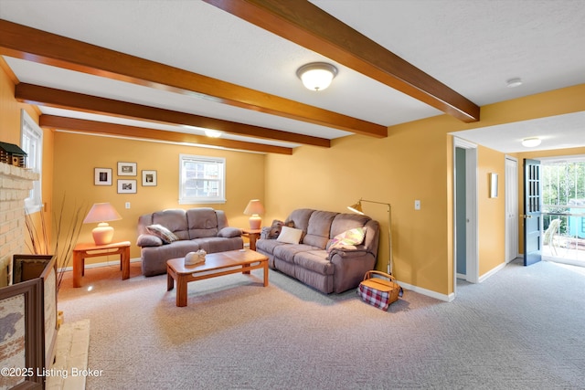 living room featuring a brick fireplace, beam ceiling, carpet flooring, and baseboards