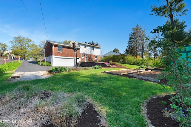 view of yard with a garage