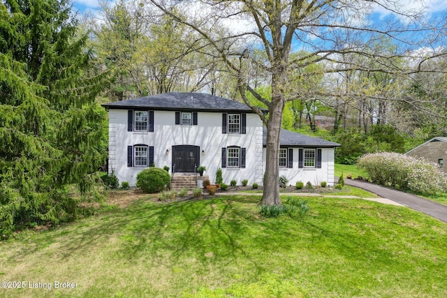 view of front of home with a front yard