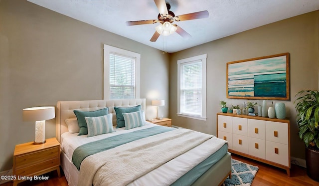 1031 S 7th St, Louisville, KY 40203 - bedroom featuring wood finished floors and a ceiling fan