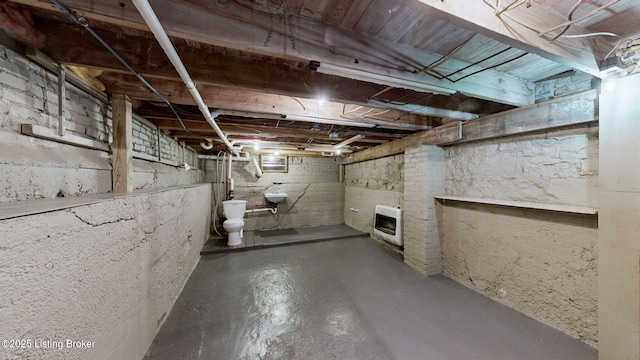 1031 S 7th St, Louisville, KY 40203 - unfinished basement featuring heating unit and a sink