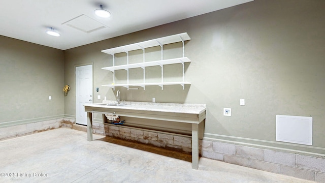 1031 S 7th St, Louisville, KY 40203 - kitchen with a sink, open shelves, and baseboards