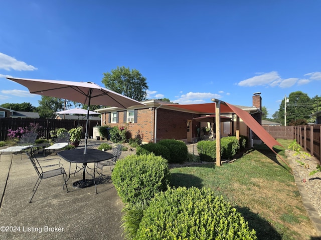 exterior space with a fenced backyard