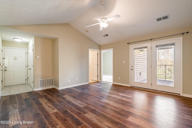 10202 Deer Vista Dr Unit 202, Louisville, KY 40291 - spare room featuring wood finished floors, vaulted ceiling, a ceiling fan, and baseboards